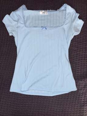 Electric Behaviour Light Blue Ribbed Knit Top with Lace Trim and Bow
